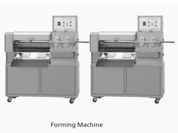 Machine à former les chewing-gums